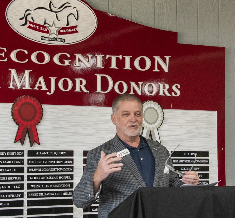 Scott Swingle, SDTR board president, welcomes dignitaries and shares stories of his years supporting the organization.